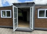 Tiny house «Complete Deluxe» 36 m² – minicasa expandible con 2 dormitorios y cocina en L