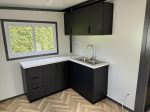 Tiny house «Complete Deluxe» 36 m² – minicasa expandible con 2 dormitorios y cocina en L
