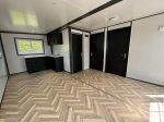 Tiny house «Complete Deluxe» 36 m² – minicasa expandible con 2 dormitorios y cocina en L