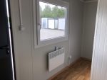 Contenedor oficina y vivienda 4×2,2 m con baño y ducha – aislamiento 7,5 cm (puerta Hörmann)