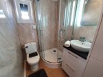 Casa móvil «Reale III» 12x4 m – fachada de madera y 3 dormitorios (totalmente equipada con electrodomésticos)
