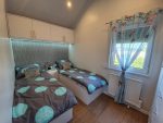Casa móvil «Reale III» 12x4 m – fachada de madera y 3 dormitorios (totalmente equipada con electrodomésticos)
