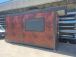 Garita prefabricada «Architectural» (6×3,5 m) – acabado Corten, baño para personas con movilidad reducida e informe energético