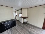 Casa móvil «Chalet Wood Gray» 10,8 x 3,7 m – diseño moderno con bow window y doble entrada
