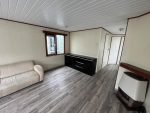 Casa móvil «Chalet Wood Gray» 10,8 x 3,7 m – diseño moderno con bow window y doble entrada