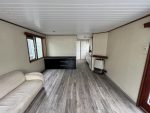 Casa móvil «Chalet Wood Gray» 10,8 x 3,7 m – diseño moderno con bow window y doble entrada
