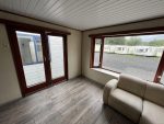 Casa móvil «Chalet Wood Gray» 10,8 x 3,7 m – diseño moderno con bow window y doble entrada