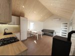 Casa móvil «Reale II» 12x4 m – tejado a 30° con estufa de pellets y techo de madera (3 dormitorios)