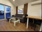 Nueva casa móvil 10x4 m «Modelo II» – tejado 30° con calefacción híbrida y chimenea de pellets (bajo pedido)