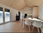 Casa móvil «Reale II» 12x4 m – tejado a 30° con estufa de pellets y techo de madera (3 dormitorios)