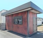 Garita prefabricada «Architectural» (6×3,5 m) – acabado Corten, baño para personas con movilidad reducida e informe energético