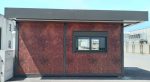 Garita prefabricada «Architectural» (6×3,5 m) – acabado Corten, baño para personas con movilidad reducida e informe energético