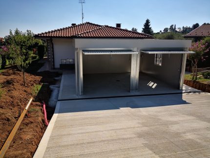 Garaje prefabricado doble 6x6 m aislado – 2 plazas de aparcamiento con portones basculantes motorizados