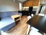 Casa móvil «Samos 2» 10×3,5 m – diseño moderno con 3 dormitorios (cocina negro mate y madera)
