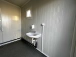 Contenedor sanitario 20 pies usado (6×2,4 m) – bloque de 6 duchas con caldera de 300 l y lavandería