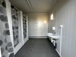 Contenedor sanitario 20 pies usado (6×2,4 m) – bloque de 6 duchas con caldera de 300 l y lavandería