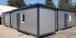 Contenedor oficina social 15 m² (6×2,5 m) – monobloque aislado 100 mm (listo para usar)