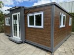 Tiny house «Complete Deluxe» 36 m² – minicasa expandible con 2 dormitorios y cocina en L