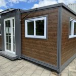 Tiny house «Complete Deluxe» 36 m² – minicasa expandible con 2 dormitorios y cocina en L
