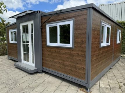 Tiny house «Complete Deluxe» 36 m² – minicasa expandible con 2 dormitorios y cocina en L